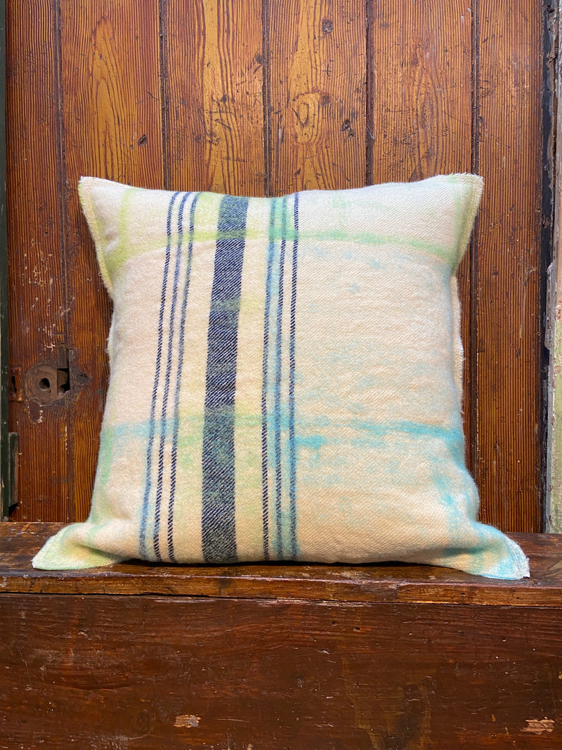 Handmade felted cushion with vintage blankets and handwork. Square soft lime green and blue felt. By Lost and Found Projects and JMR Design