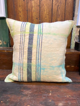 Handmade felted cushion with vintage blankets and handwork. Square soft lime green and blue felt. By Lost and Found Projects and JMR Design