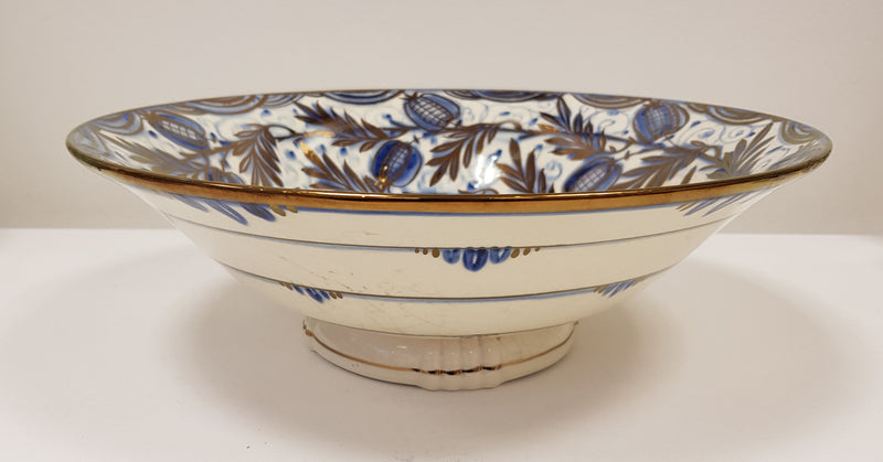 Large hand thrown bowl decorated with blue and gold on creamware body glazed signed by Gordon Forsyth