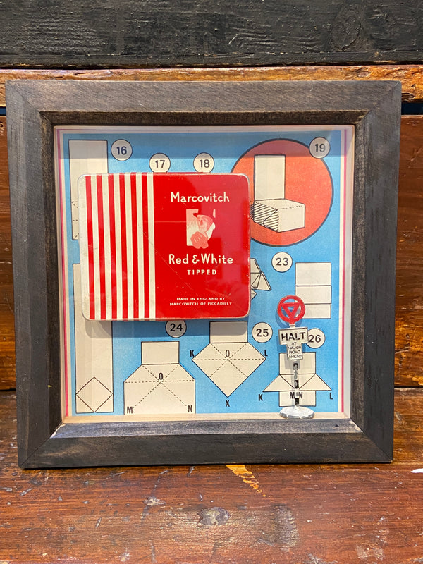 Vintage ‘Marcovitch Red and White Tipped’ tin framed with vintage book art. By Lost and Found Projects.