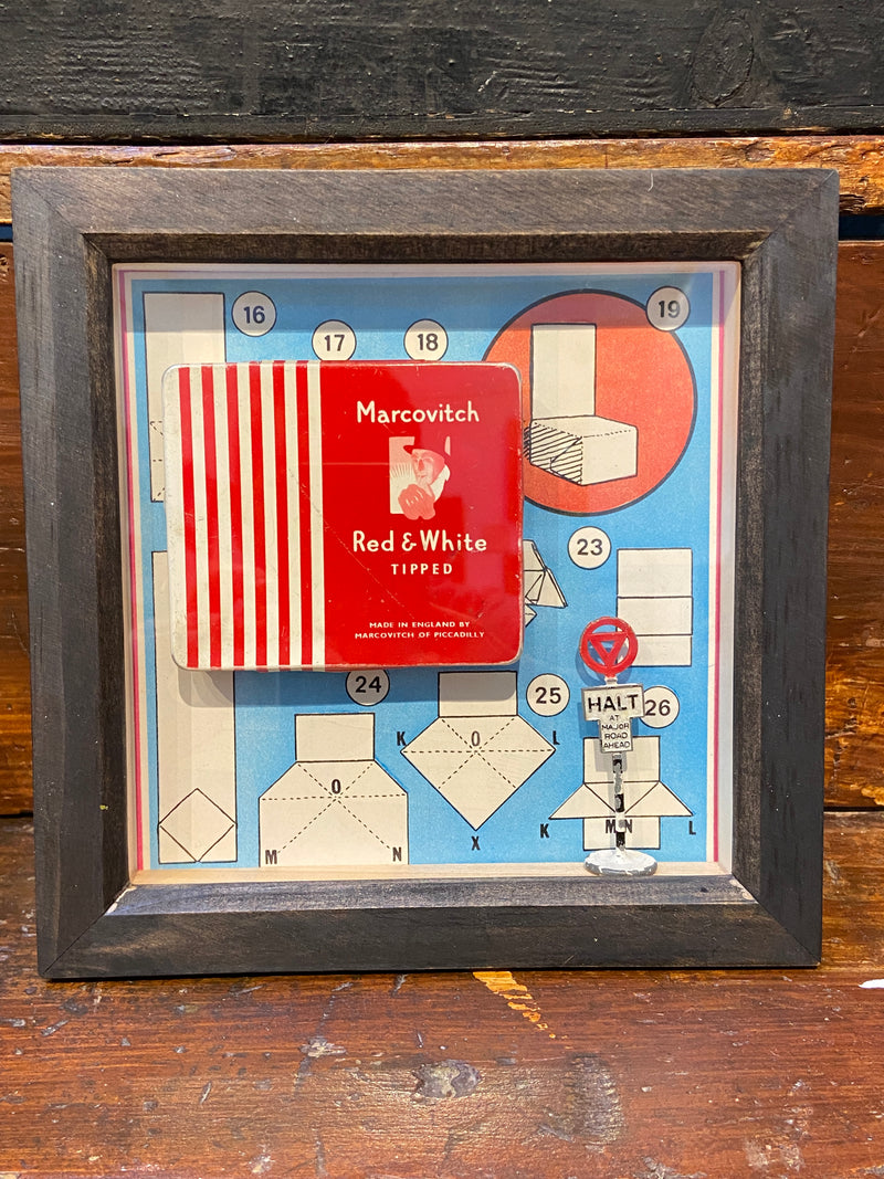 Vintage ‘Marcovitch Red and White Tipped’ tin framed with vintage book art. By Lost and Found Projects.