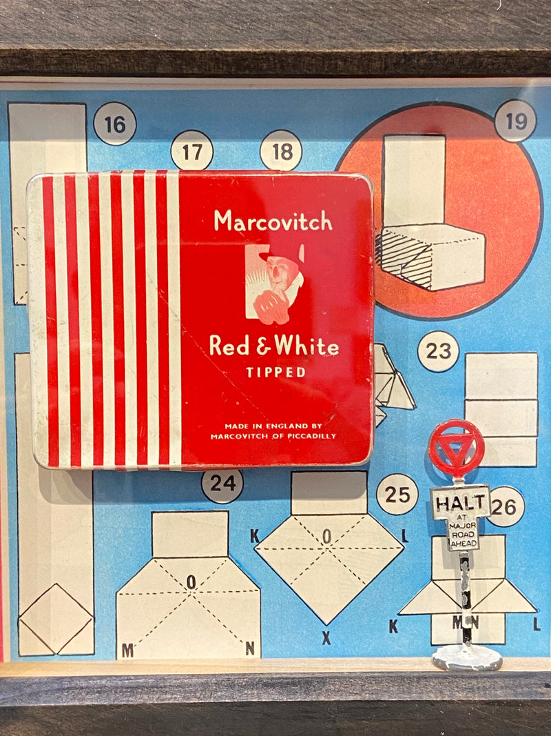 Vintage ‘Marcovitch Red and White Tipped’ tin framed with vintage book art. By Lost and Found Projects.