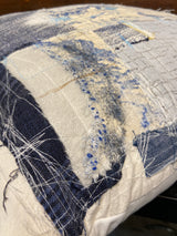Handmade reworked cushion in salvage linen, denim, fabrics and treads. By Lost and Found Projects and JMR Design