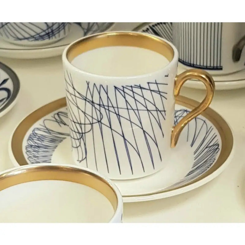 FLUX Spiro Collection by Harry Davies for FLUX Stoke on Trent Tall espresso cup and saucer Gold Ceramics from Barewall Art Gallery
