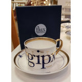 FLUX Type Matters range by Jim Williams for FLUX Stoke on Trent Tea cup and saucer Gold Ceramics from Barewall Art Gallery