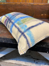 Handmade felted cushion with vintage blankets and handwork. Oblong blue and purple felt. By Lost and Found Projects and JMR Design by Barewall