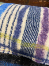 Handmade felted cushion with vintage blankets and handwork. Oblong blue and purple felt. By Lost and Found Projects and JMR Design by Barewall