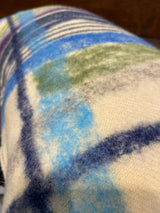 Handmade felted cushion with vintage blankets and handwork. Oblong blue and purple felt. By Lost and Found Projects and JMR Design by Barewall