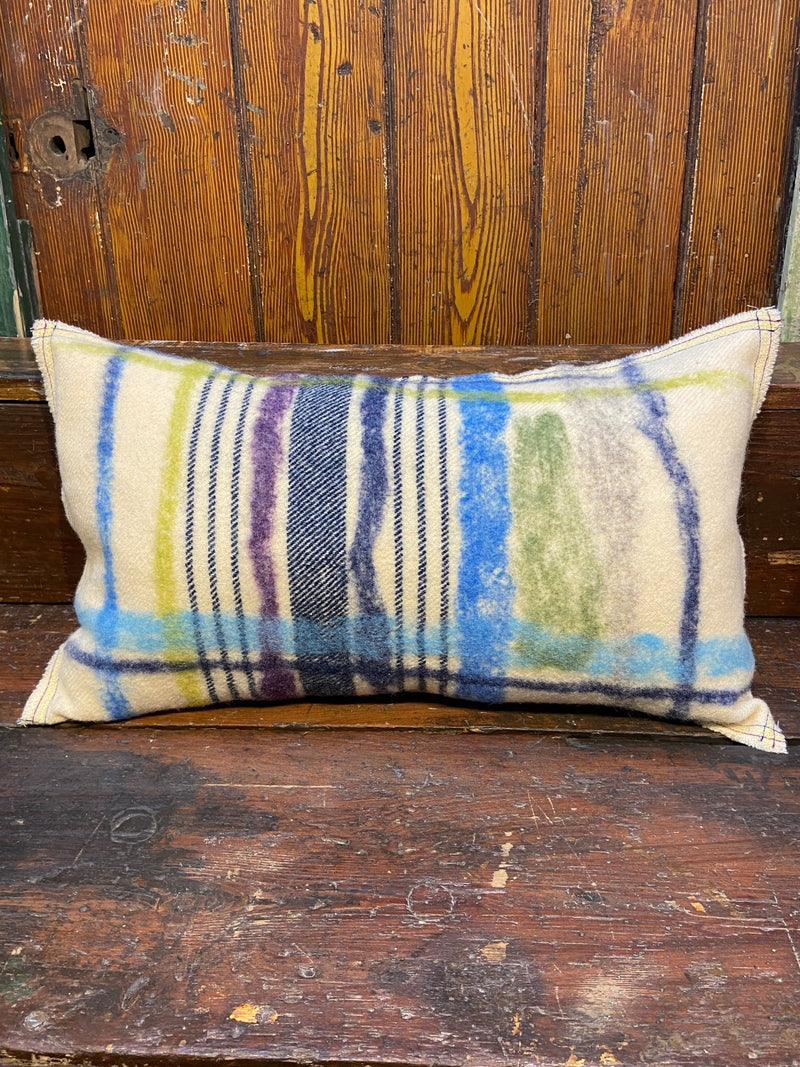 Handmade felted cushion with vintage blankets and handwork. Oblong blue and purple felt. By Lost and Found Projects and JMR Design by Barewall