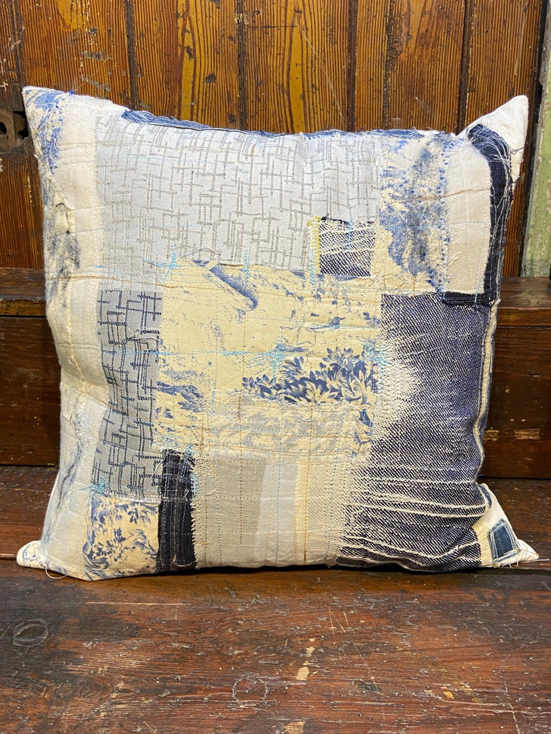 Handmade reworked cushion in salvage linen, denim, fabrics and treads. By Lost and Found Projects and JMR Design by Barewall