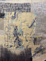 Handmade reworked cushion in salvage linen, denim, fabrics and treads. By Lost and Found Projects and JMR Design by Barewall