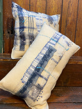Handmade reworked oblong cushion in vintage blanket and salvage treads (blue). By Lost and Found Projects and JMR Design by Barewall