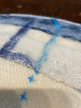 Handmade reworked oblong cushion in vintage blanket and salvage treads (blue). By Lost and Found Projects and JMR Design by Barewall