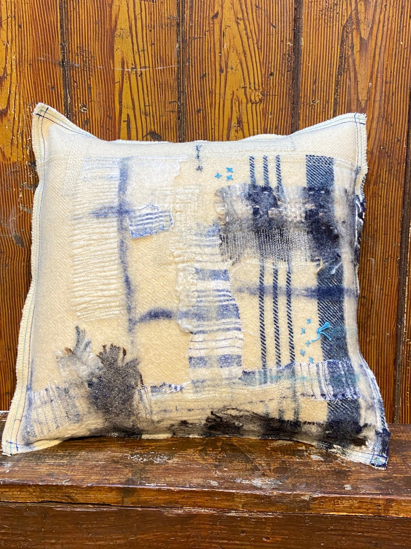 Handmade reworked square cushion in vintage blanket and salvage treads (blue). By Lost and Found Projects and JMR Design by Barewall