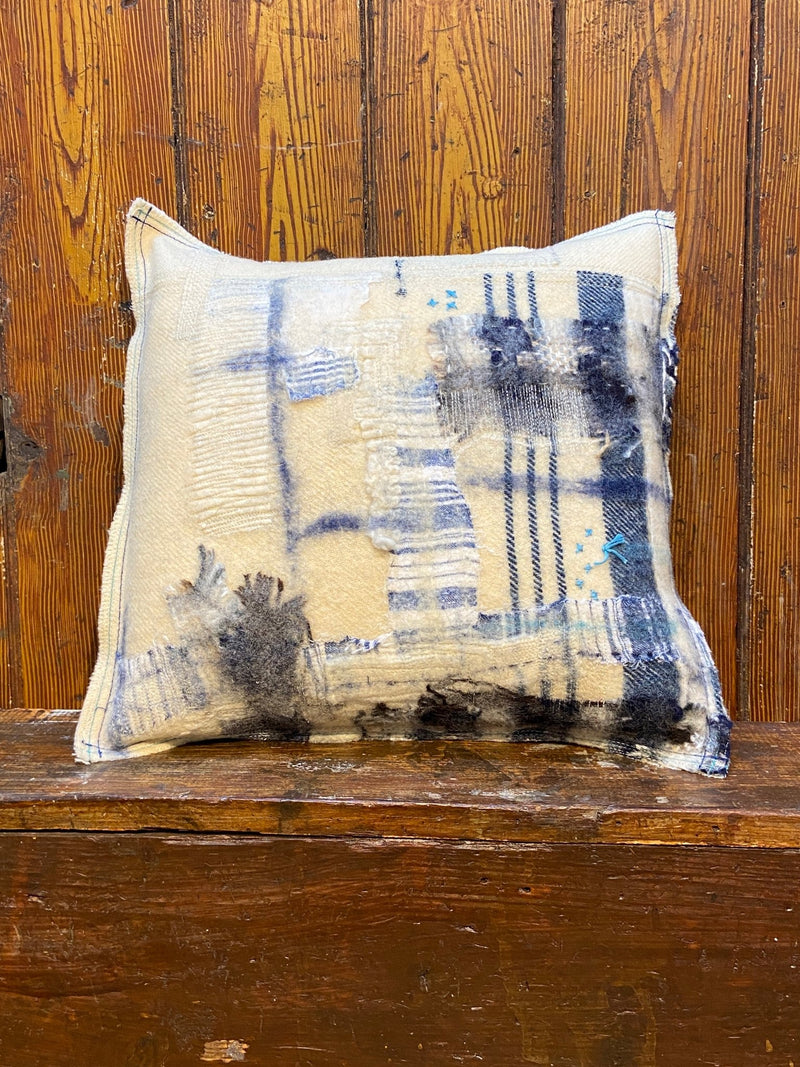 Handmade reworked square cushion in vintage blanket and salvage treads (blue). By Lost and Found Projects and JMR Design by Barewall