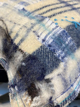 Handmade reworked square cushion in vintage blanket and salvage treads (blue). By Lost and Found Projects and JMR Design by Barewall