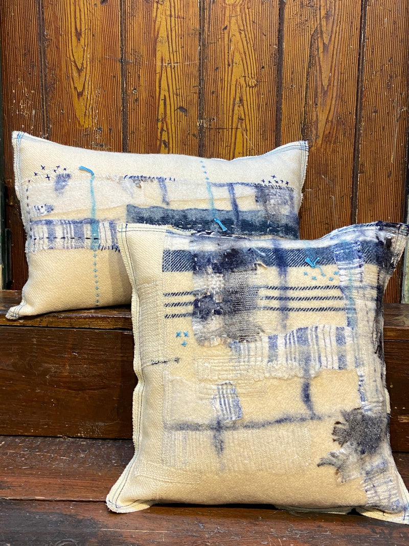 Handmade reworked square cushion in vintage blanket and salvage treads (blue). By Lost and Found Projects and JMR Design by Barewall