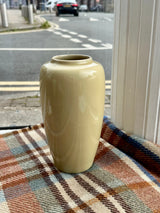 Hand thrown muted yellow gloss finish vase by Agnete Hoy