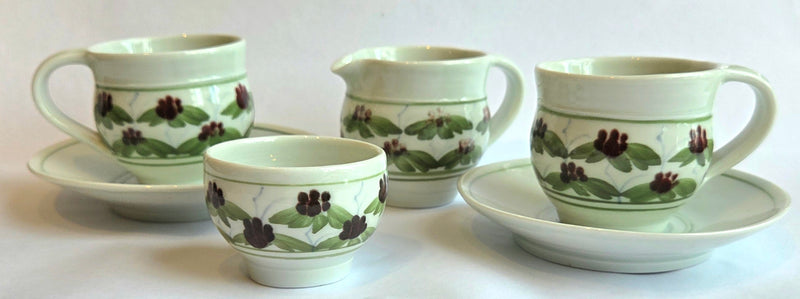 Two cups, saucers, cream jug and sugar bowl 2004 by Derek Emms