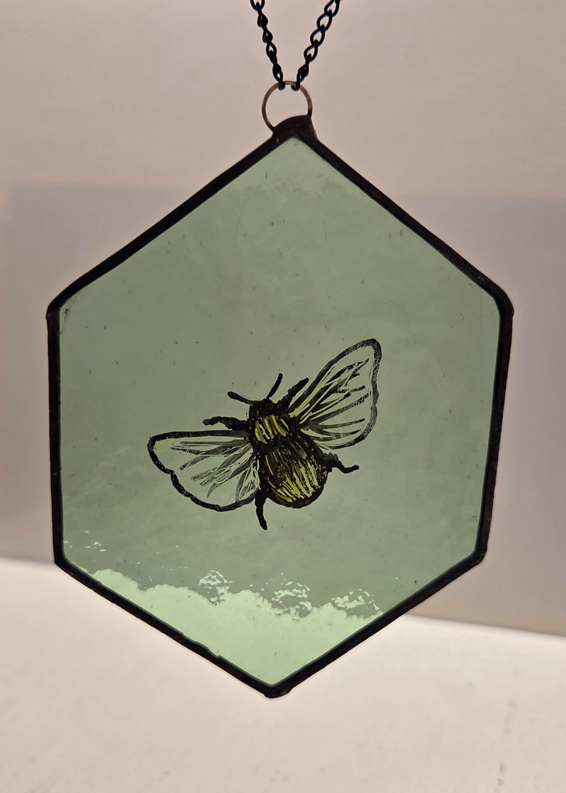 Reclaimed Stained Glass Hexagonal with painted bee 2025 by Rebecca Davies Bee on hexagonal reclaimed leaded vintage green glass Glass from Barewall Art Gallery