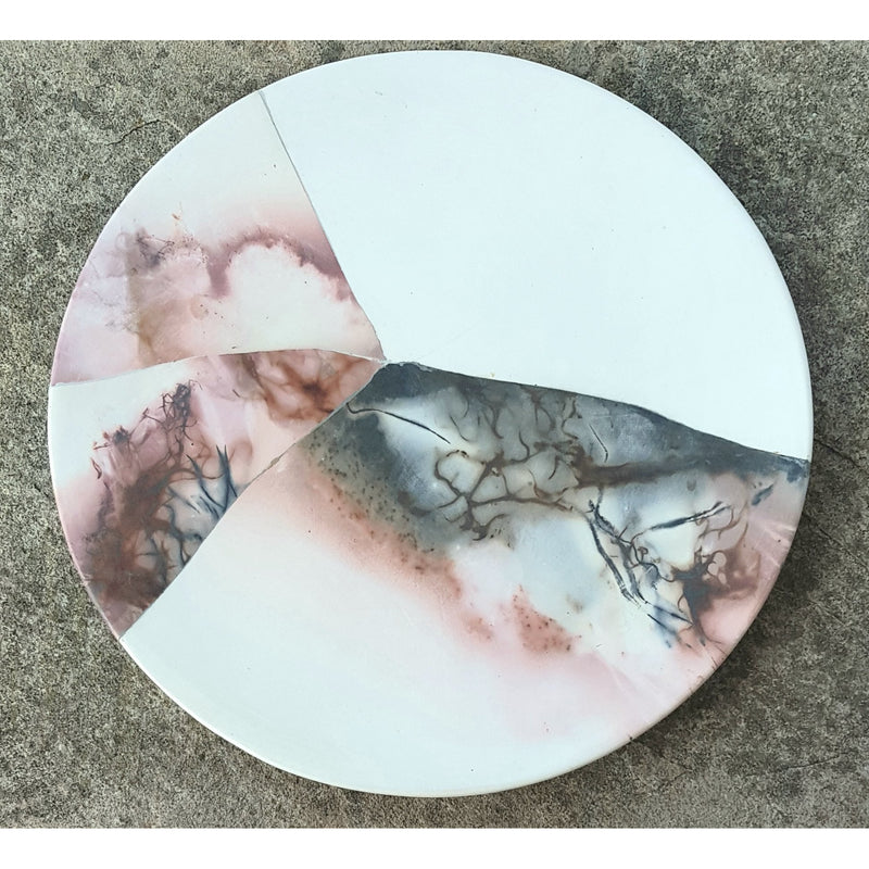 Round reconstructed plates by June Ridgway