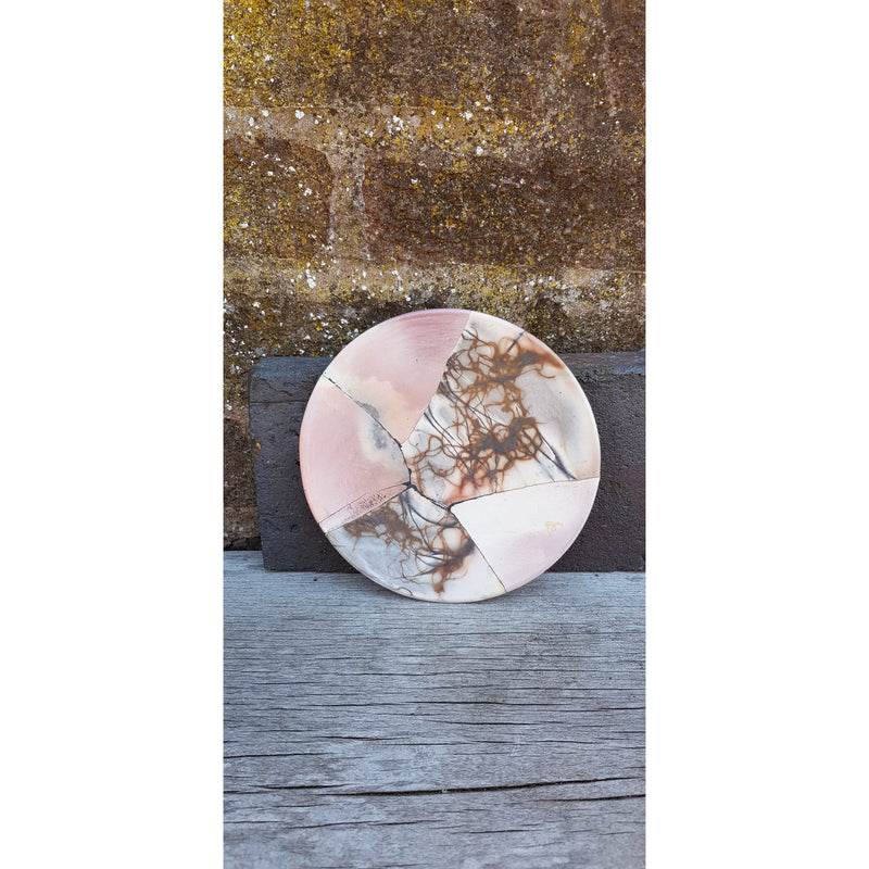 Round reconstructed plates by June Ridgway