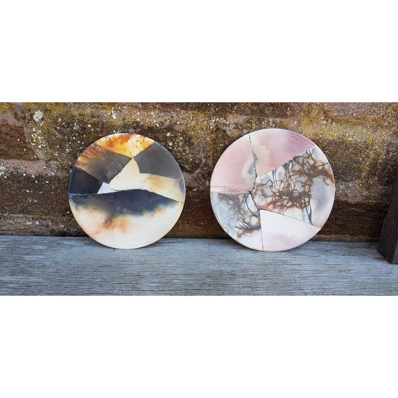 Round reconstructed plates by June Ridgway