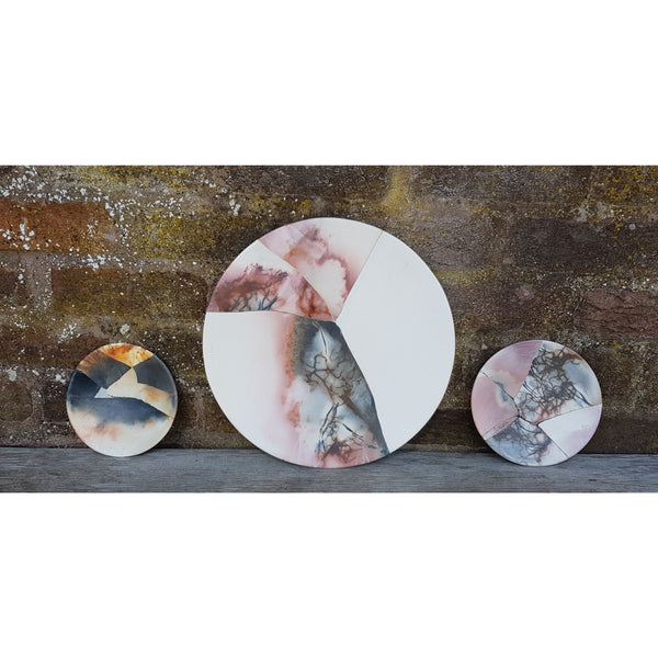 Round reconstructed plates by June Ridgway