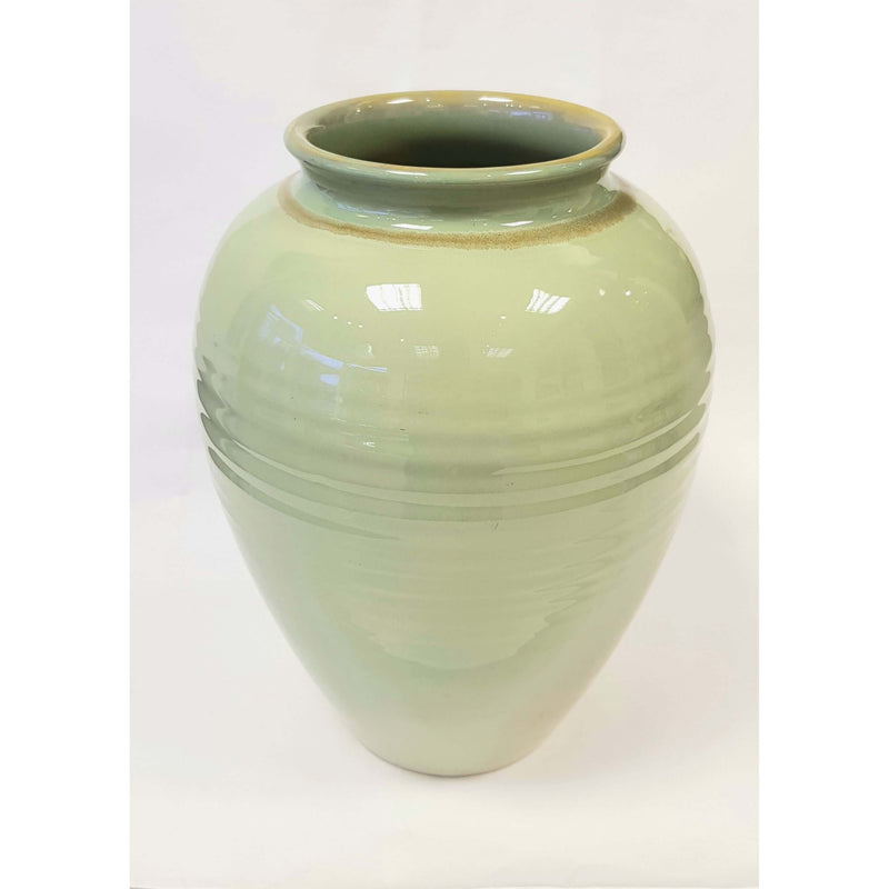 Large hand thrown vase decorated in light green glaze by Anne Potts for Bullers